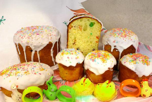 Traditional Georgian Easter Paska bread with icing and colorful sprinkles