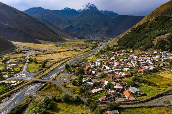 Sno Village with Kazbek Mount on the Background