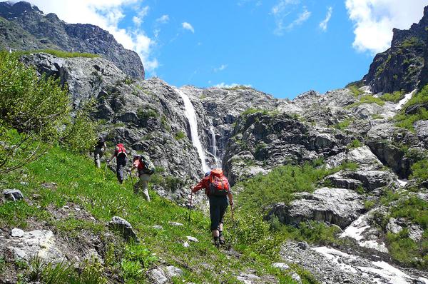 Tourists Hiking to the Shdugra Waterfall in Svaneti