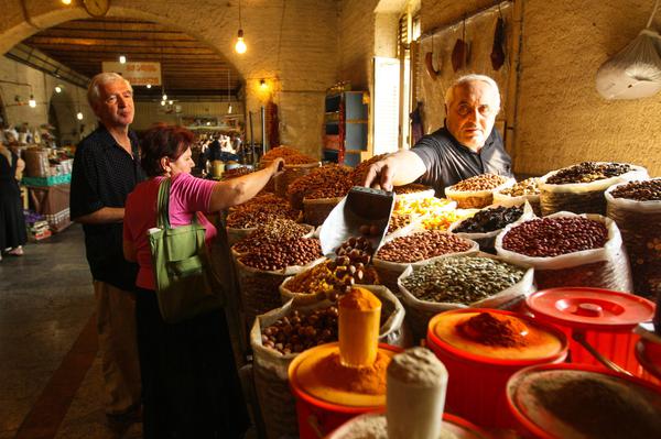 A seller on central food market in Tbilisi
