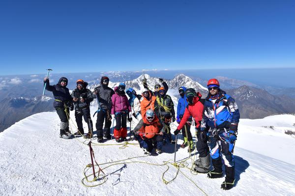 Kazbek - People Standing at Kazbek Summit