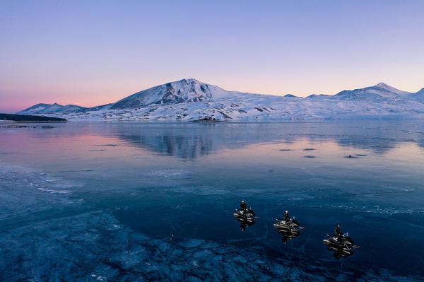 Frozen Tabatskuri Lake on a Snowmobiling Tour