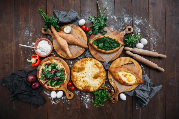 Traditional Georgian Set of Different Khachapuri on the table