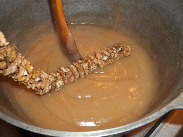 Preparing walnuts churchkhela