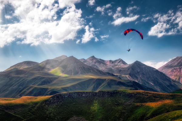 tandem paragliding with a certified pilot over Gudauri’s stunning Caucasus landscapes