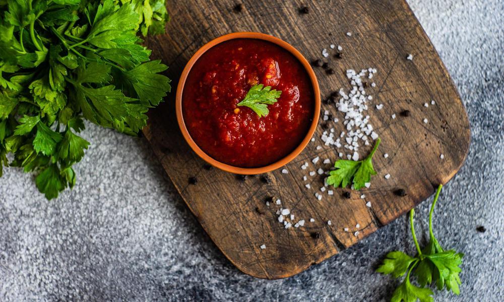 Exploring Satsebeli Sauce: A Georgian Culinary Marvel with Tomatoes, Peppers, Garlic, and Ajika