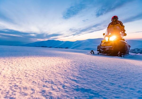 Experience the thrill of Georgia’s winter landscapes on a private snowmobile tour