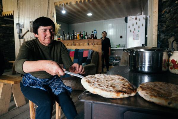 Georgian Woman Cooking Traditional Kubdari Meat Pie