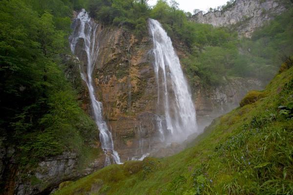 Majestic view of Abasha Waterfall, surrounded by lush forests in Samegrelo, Georgia