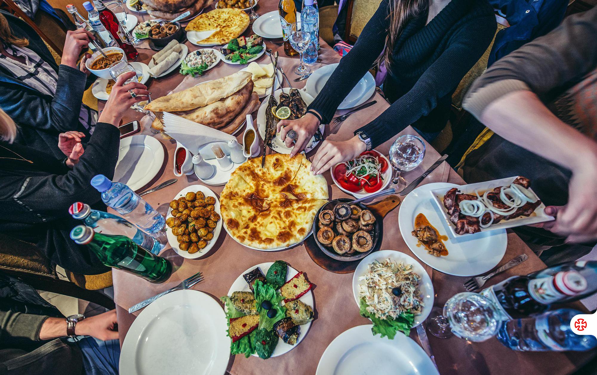 A restaurant table full fo Georgian traditional food