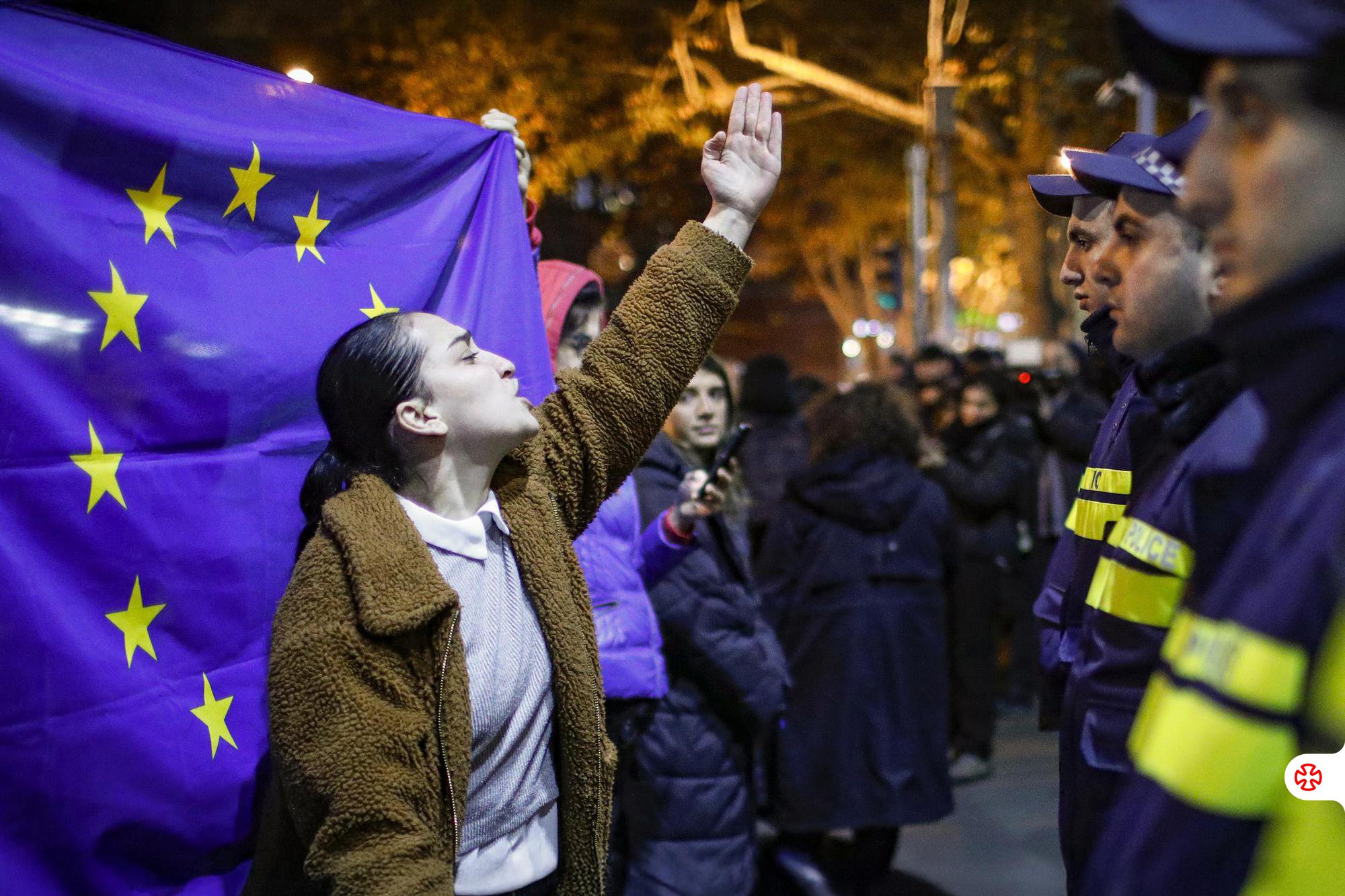 A protester confronts police during demonstrations in Tbilisi
